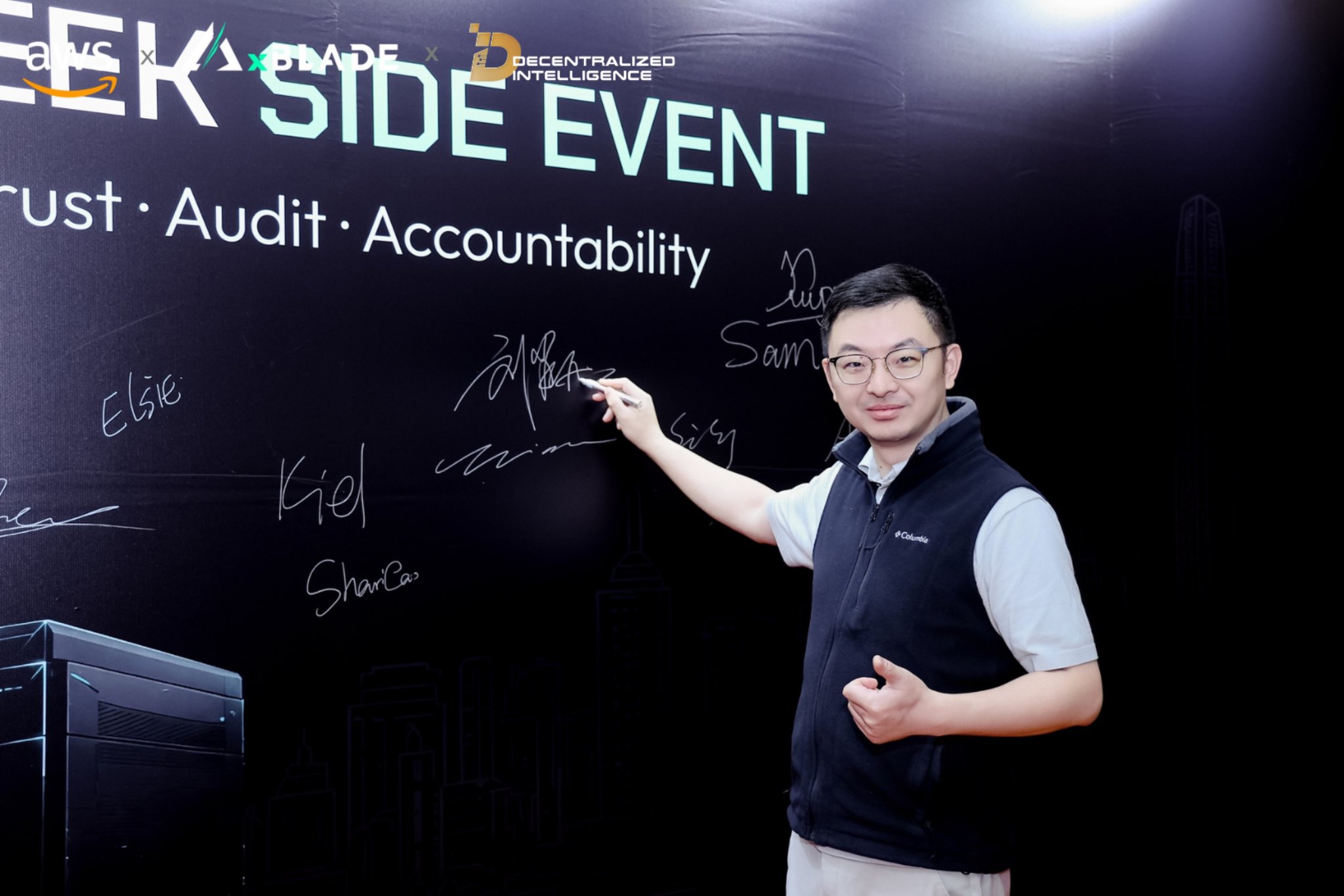 An attendee at the AWS, xBLADE, and DI event signing wall in Hong Kong.